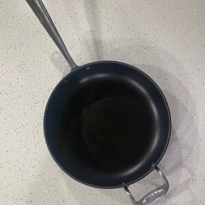 Sleek Black Frying Pan with Ergonomic Handle